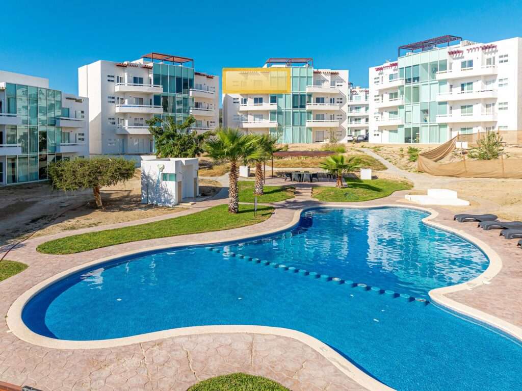 Los Cabos Solaria OWNER FINANCING AVAILABLE AND NEW FURNITURE PACKAGE! Outstanding 2 bed, 2 bath corner condo with beautiful ocean for sale
