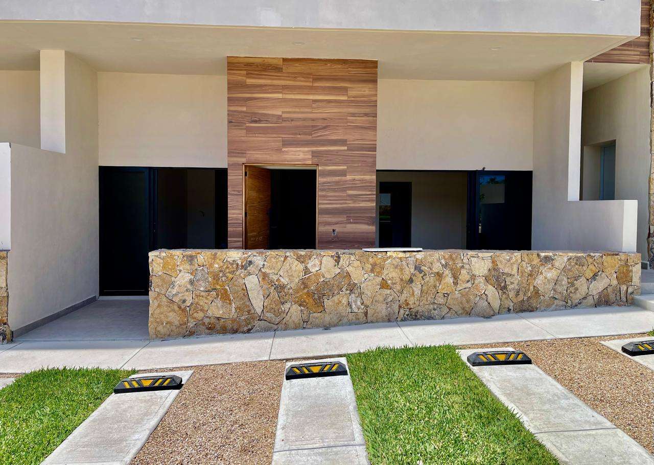 Los Cabos Brisas Del Tezal Ready for delivery! Brisas del Tezal ground-floor condo featuring 2 bedrooms and 2 bathrooms in an exclusive low-density community of 36 units across two 4-story elevator buildings. Located minutes from Medano Beach and downtown Cabo. Showcases excellent construction quality and craftsmanship from the developer, including parota wood carpentry and a large, solid front door. Features rare 3.7 meter-12.4 ft high ceilings, creating an exceptional sense of space and light, marble flooring throughout, spacious balcony, granite countertops and backsplash in the kitchen, pantry, bathrooms with marble showers to the ceiling, wall-to-wall closets, and a laundry room with space for side-by-side washer and dryer, plus manual washing area and storage. Equipped with 1-ton A/C mini-splits in each bedroom and two in the living area.Enjoy sunset for sale
