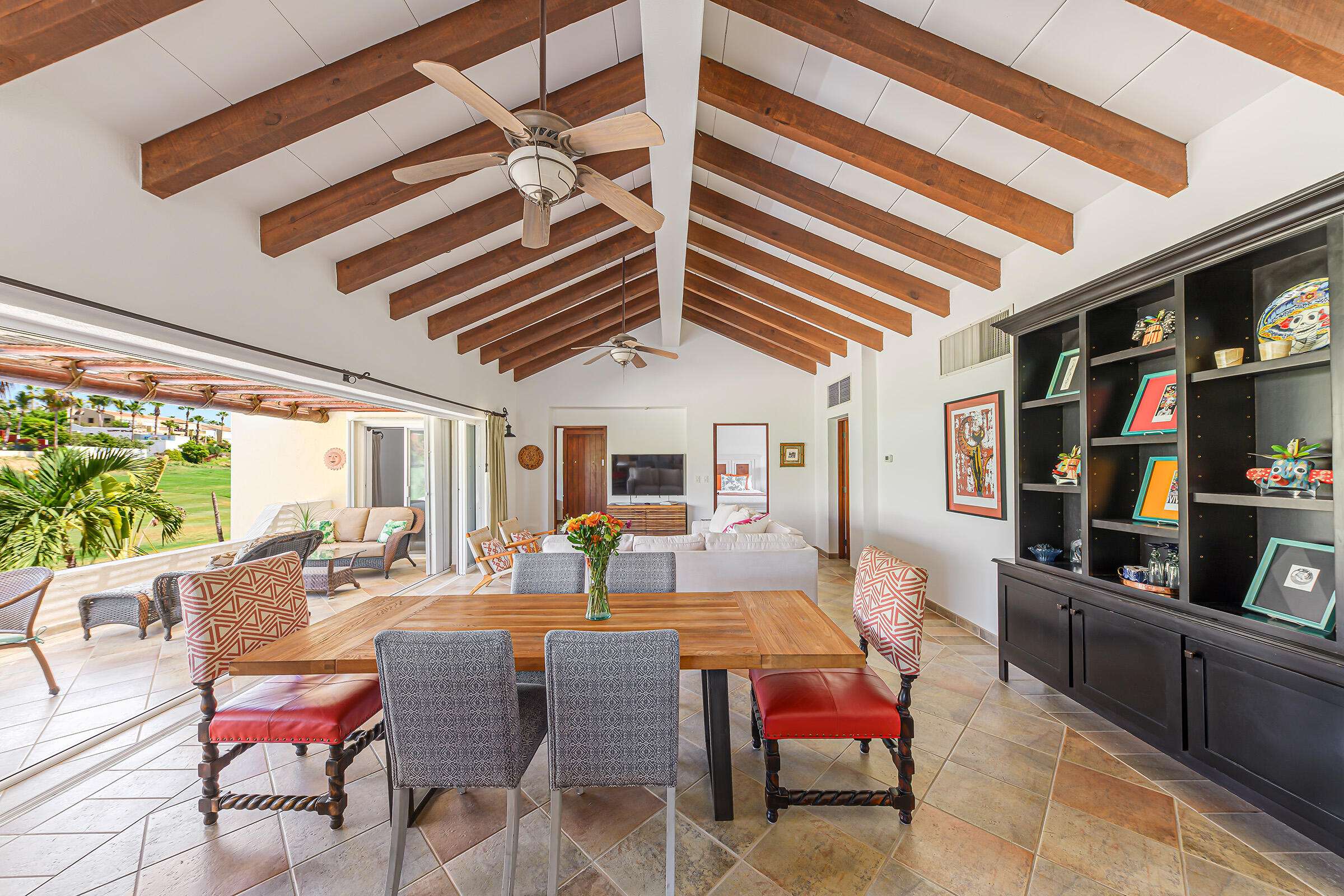 Los Cabos Las Quintas Rarely available second floor end unit 2BR, 2BA villa in boutique gated Las Quintas, walk to beach, dining, and the renowned San José Art Walk. Located in the prime San José del Cabo hotel zone near Fonatur, this private community of just 32 villas stands out from nearby large complexes.This end unit with no neighbors above offers added privacy along with manned security, two pools, jacuzzi, and spacious palapa gathering areas, creating a peaceful resort-style setting.Inside, enjoy 10-ft vaulted ceilings with decorative beams, a bright open living area, and stack-back sliding glass doors opening to a covered patio with golf course for sale
