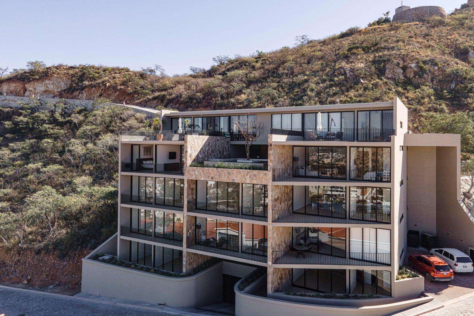 Los Cabos Pedregal One Experience the pinnacle of sophisticated Cabo living in this turnkey 2-bedroom, 2-bathroom luxury condominium nestled in the legendary hillside enclave of Pedregal. Boasting modern, contemporary finishes, this premium residence features a sleek minimalist design integrated with a spacious covered terrace--making it the ultimate canvas for indoor-outdoor Baja entertainment.Breathtaking, unobstructed vistas overlooking the sparkling city lights, rugged mountain ranges, and nearby marina. Over 1,600 square feet equipped with high-end stainless steel appliances and a premium extended kitchen island.The Location has unmatched walkability. Skip the car ride and stroll straight down to world-class sportfishing charters, upscale waterfront dining, and vibrant nightlife at the Marina Cabo San Lucas.Exclusive Amenities: 24/7 controlled security, private Pacific beach access, professional tennis/pickleball clubs, a luxury health spa, an organic farmers' market, and a dedicated community water desalination plant. Includes 2 covered underground parking spaces. for sale