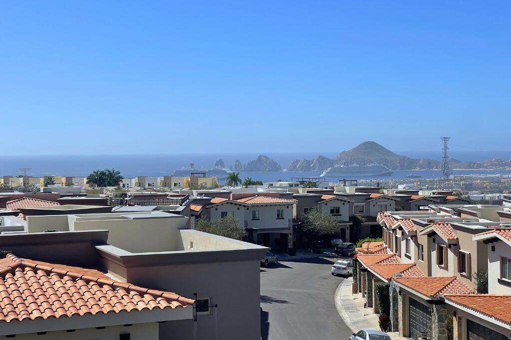 Los Cabos Magisterial Discover your perfect blend of comfort, space, and convenience in this charming 4-bedroom, 3-bath family home in the residential community of Magisterial located just minutes to shopping, the transpeninsular highway and downtown San José del Cabo. Whether you are starting a family, working from home, or simply wanting room to grow, this home offers a warm and flexible layout to fit your lifestyle.Step inside to find a partially furnished bright and airy living space that flows easily from the living room to the kitchen. A rare separate dining area with bar and fridge is steps from the kitchen and perfect for casual meals or hosting friends. A guest bedroom or perhaps a home office is down the hall on this level with a access to a full bath. Upstairs the master suite offers privacy featuring an ensuite bath, while the two other upstairs guest rooms share a full bathideal for family or visiting guests. Outside, enjoy a private backyard for weekend barbecues and pets, plus a ample and covered storage area for tools, gear and laundry. Count on gated parking for two small vehicles in the front with an electric opener for added convenience.Thoughtfully updated throughout, this home includes new AC units in every room, modern lighting and bathroom fixtures, refreshed cabinetry, updated electrical wiring, and moreso you can move right in and start living.Perfect for a growing family or professionals who value space, comfort, and proximity to everything San José del Cabo has to offer. NO HOA payments making this a solid investment with low monthly carrying costs. for sale