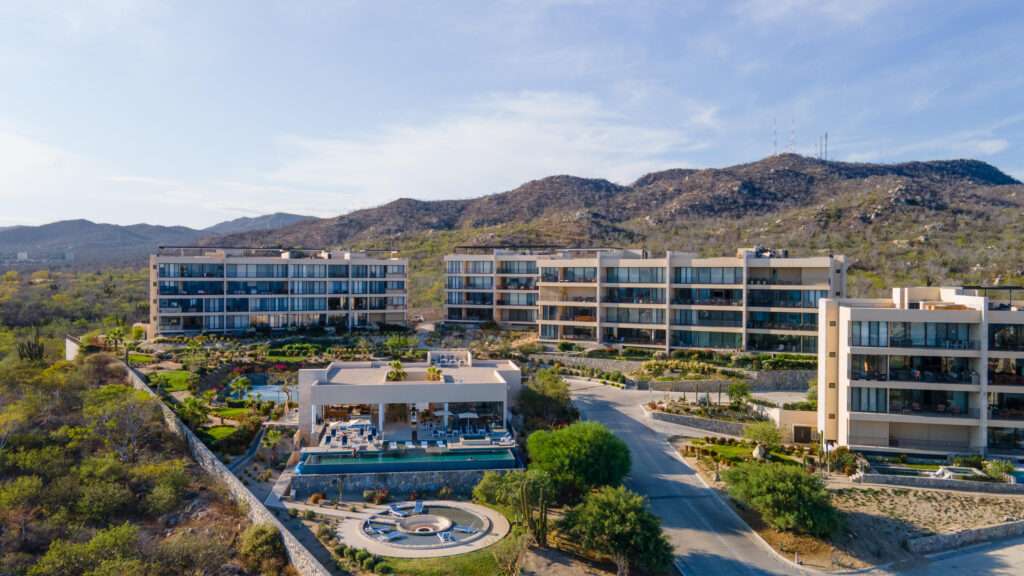 Los Cabos Dunes Residence Club Enjoy resort-style living with this 3-bedroom corner ground-floor residence at The Palmilla Dunes. This contemporary-style condo is offered fully furnished and turn-key, blending modern design with warm finishes, including travertine floors, parota wood furnishings, and GE Profile appliances. The ''Palm Garden Residence'' layout features a primary bedroom with a king bed and private terrace, plus two back bedrooms, one with two double beds and one with a king, making it ideal for family and guests. Indoor-outdoor living is seamless with pocket doors, a covered exterior terrace, and BBQ area, complemented by a private putting green perfect for fun and entertaining. An oversized one-car garage is located directly in front of the unit, and a luxury six-seater golf cart is included for convenient access to Palmilla's shopping centers, restaurants, and swimmable beach.Whether you're looking for a private vacation retreat or an investment rental, this property offers a ready-to-enjoy lifestyle, with optional access to The Dunes Club amenities, including tennis, pickleball, and paddle courts, gym and spa, semi-Olympic pool, jacuzzi, movie theater, sports bar, and clubhouse. – SOLARIA G, Cabo Corridor, Cabo Corridor, BS