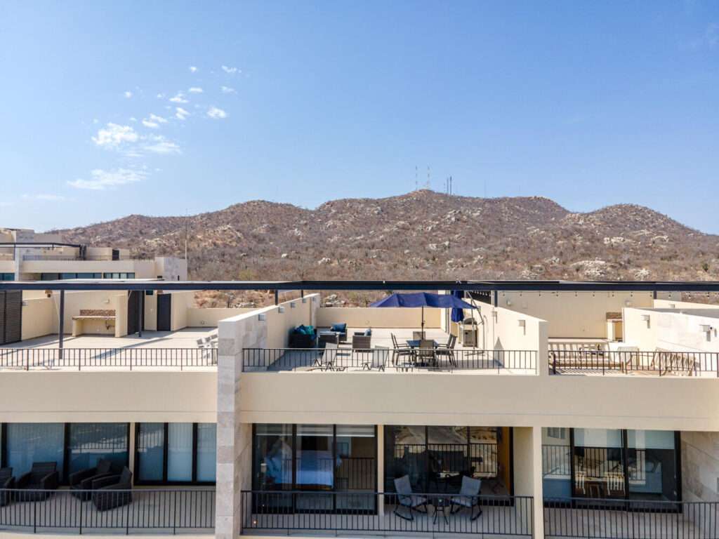 Los Cabos Breeze Of Cabo Discover this modern 2-bedroom, 2-bathroom condo located in the highly sought-after Sunset area of Cabo San Lucas. This corner unit offers maximum privacy with only one neighbor and features spacious windows and a cozy terrace where you can enjoy breathtaking sunrises and sunsets. The property includes underground parking, access to a shared rooftop with a swimming pool and panoramic ocean – Solaria Turnkey Penthouse, Cabo Corridor, BS