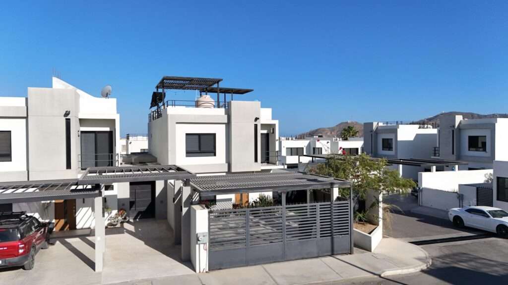 Los Cabos Magisterial Discover your perfect blend of comfort, space, and convenience in this charming 4-bedroom, 3-bath family home in the residential community of Magisterial located just minutes to shopping, the transpeninsular highway and downtown San José del Cabo. Whether you are starting a family, working from home, or simply wanting room to grow, this home offers a warm and flexible layout to fit your lifestyle.Step inside to find a partially furnished bright and airy living space that flows easily from the living room to the kitchen. A rare separate dining area with bar and fridge is steps from the kitchen and perfect for casual meals or hosting friends. A guest bedroom or perhaps a home office is down the hall on this level with a access to a full bath. Upstairs the master suite offers privacy featuring an ensuite bath, while the two other upstairs guest rooms share a full bathideal for family or visiting guests. Outside, enjoy a private backyard for weekend barbecues and pets, plus a ample and covered storage area for tools, gear and laundry. Count on gated parking for two small vehicles in the front with an electric opener for added convenience.Thoughtfully updated throughout, this home includes new AC units in every room, modern lighting and bathroom fixtures, refreshed cabinetry, updated electrical wiring, and moreso you can move right in and start living.Perfect for a growing family or professionals who value space, comfort, and proximity to everything San José del Cabo has to offer. NO HOA payments making this a solid investment with low monthly carrying costs. for sale