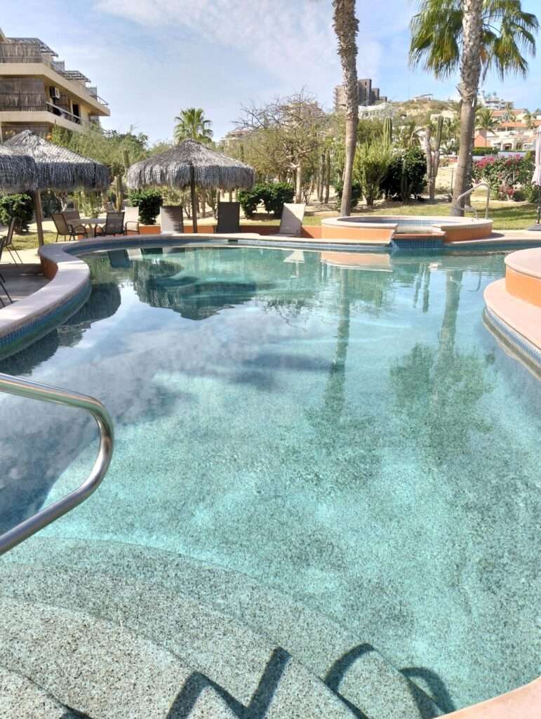 Los Cabos Club La Costa End unit 1 bedroom/1 bath unit in great condition in a fully gated community on the Vidanta Golf Course.. Ground level for easy access with large 13' X 18' deck. unit location has both front and side gardens offering more privacy. Has many additional built-ins, has never been a rental and features exclusive assigned parking space out front of the building. F2 offers 3 swimming pools plus hot tubs. Shops, restaurants, beach and public transportation are just a minutes walk away. Comes partially furnished and ready for your personal touches. – Villa 7 F2 Retorno Punta Gorda, San Jose del Cabo, BS
