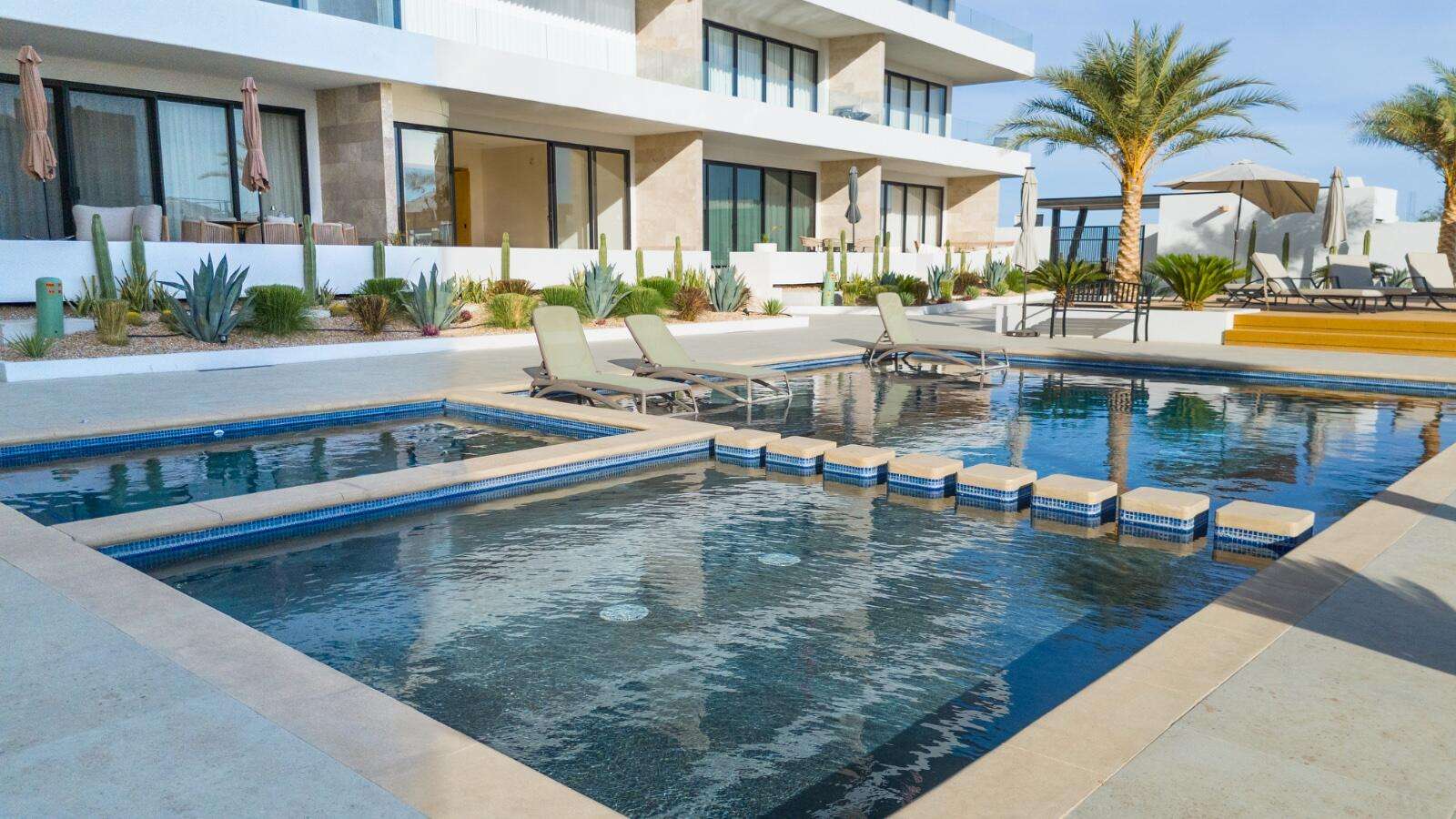 Los Cabos Breeze Of Cabo Discover this modern 2-bedroom, 2-bathroom condo located in the highly sought-after Sunset area of Cabo San Lucas. This corner unit offers maximum privacy with only one neighbor and features spacious windows and a cozy terrace where you can enjoy breathtaking sunrises and sunsets. The property includes underground parking, access to a shared rooftop with a swimming pool and panoramic ocean for sale