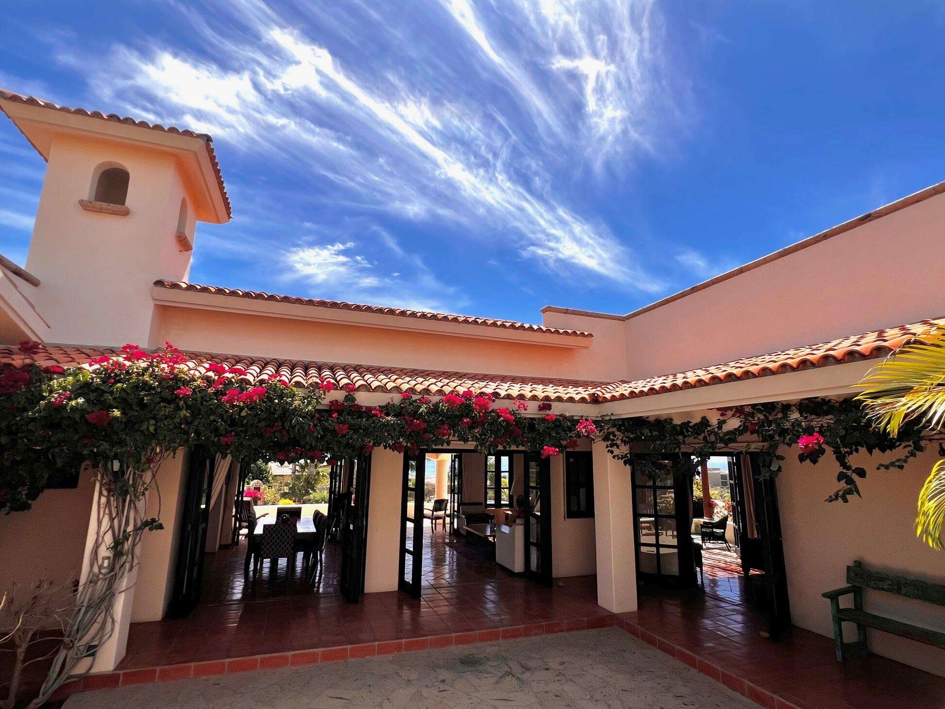 Los Cabos La Noria One of the first homes built in La Noria, within the amenity rich development of Puerto Los Cabos, this very unique two bedroom, two bath home, followed the Hacienda style's original design guidelines, with a large entry courtyard, rooms to the sides and opening to the main living area, kitchen and outdoor patio/deck.The initial concept and plans were designed with a third bedroom in mind, to be built at a different time, yet the functionality of the two bedroom house ended up suiting its owners well and thus house did not grow within the still remaining buildable area of the homesite.Subsequently, a second design concept was planned, to build a second level master bedroom with panoramic – 13B Los Frailes, San Jose del Cabo, BS