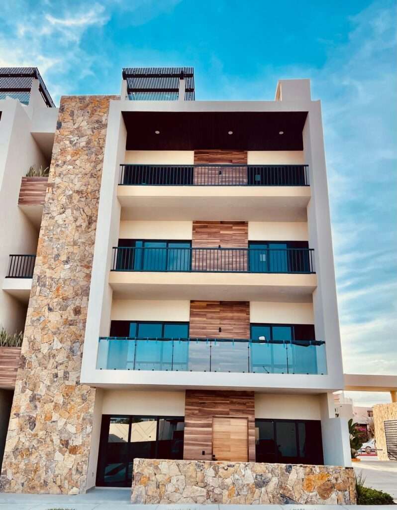 Los Cabos Brisas del tezal Ready for immediate delivery! Beautiful ground-floor 2BR/2BA condo in Brisas del Tezal, an exclusive low-density community of only 36 residences in two 4-story elevator buildings. Just minutes from Medano Beach, downtown Cabo, shopping, golf, and restaurants. Features premium finishes including marble floors, granite countertops, parota wood carpentry, floor-to-ceiling marble showers, pantry, laundry room, wall-to-wall closets, mini-split A/C throughout, and a spacious terrace. No adjoining side neighbors for exceptional privacy. Resort-style amenities include a heated pool, clubhouse, coworking space with Wi-Fi, BBQ area, playground, landscaped grounds, 24/7 security, and immediate occupancy. Ideal for full-time living, vacation use, or investment. – 2 bedroom Ground-Floor Close to the Pool, Cabo Corridor, Baja California Sur BS