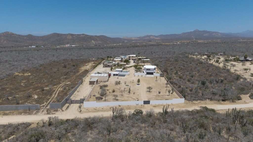 Los Cabos El Tule-Inland:General Rare investor opportunity in the San José Corridor. 2 luxury residences fully completed and move-in ready. 8 additional units with land secured and full blueprints in place -- ready to build to buyer's vision. At – El Tule, San Jose Corridor, BS