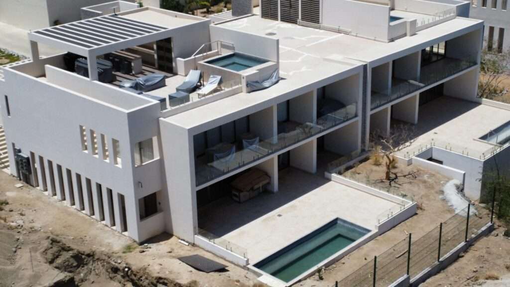 Los Cabos Santa Rita This charming townhome is located in a secluded enclave of eight in the exclusive neighborhood known as Pedregal de Cabo San Lucas just steps to town. This 2 bedroom 2.5 bathroom offers private access through an electric gate and a carport with a pergola. As well as a pool and BBQ available for residents. Beautiful top of the line finishes throughout. With an open concept layout, balconies in each bedroom, an open courtyard, walk-in closet, marble and granite counters add to the charm of this spacious townhome. Residents enjoy the local amenities redefining the Cabo lifestyle and to the most discerning individuals who call this their home away from home. From beach access where the sparkling waters of the Pacific Ocean contrast the sunset where you can watch the seasonal whales and turtle release, to a gym & spa offering treatments and a relaxation experience. Residents have exclusive access to establishments offering exquisite cuisine, The courts cafe offering breakfast & lunch as well as Fenix Restaurant offering day and night service. As well, in the heart of the development, with mountain – location location location, Cabo Corridor, BS
