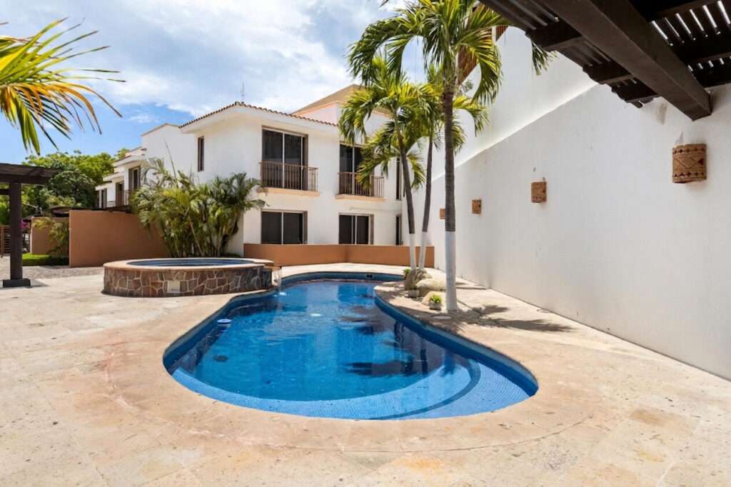 Los Cabos Santa Rita This charming townhome is located in a secluded enclave of eight in the exclusive neighborhood known as Pedregal de Cabo San Lucas just steps to town. This 2 bedroom 2.5 bathroom offers private access through an electric gate and a carport with a pergola. As well as a pool and BBQ available for residents. Beautiful top of the line finishes throughout. With an open concept layout, balconies in each bedroom, an open courtyard, walk-in closet, marble and granite counters add to the charm of this spacious townhome. Residents enjoy the local amenities redefining the Cabo lifestyle and to the most discerning individuals who call this their home away from home. From beach access where the sparkling waters of the Pacific Ocean contrast the sunset where you can watch the seasonal whales and turtle release, to a gym & spa offering treatments and a relaxation experience. Residents have exclusive access to establishments offering exquisite cuisine, The courts cafe offering breakfast & lunch as well as Fenix Restaurant offering day and night service. As well, in the heart of the development, with mountain – Pedregal de Cabo San Lucas, Cabo San Lucas, BS