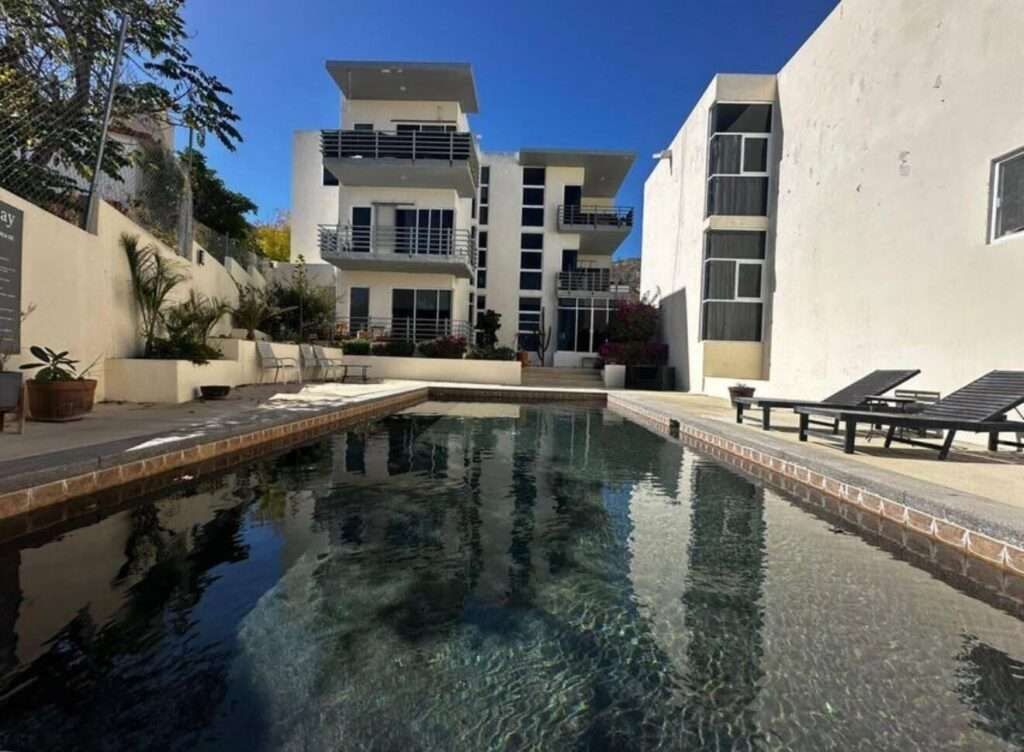 Los Cabos Centro Exceptional Space, Prime Location & Outstanding Investment OpportunityDiscover the perfect combination of location, space, and lifestyle in this spacious condominium, ideally situated just 2 minutes by car or approximately a 10-minute walk from downtown Cabo San Lucas. Enjoy quick access to the Marina, restaurants, shopping, beaches, and everyday conveniences while living in a peaceful residential community.Offering 118 m² (1,270 sq. ft.) of interior living space plus a 19 m² (205 sq. ft.) private patio, this home is significantly larger than most two-bedroom condos currently available in Cabo San Lucas. Property features include:* 2 oversized bedrooms, each with its own closet.* 2 full bathrooms.* Spacious primary suite with an en-suite bathroom.* Large open-concept living and dining area, ideal for entertaining or relaxing.One of the property's standout features is the 19 m² private patio, providing endless possibilities to create your own outdoor oasis--whether as a lounge area, garden, outdoor dining space, or pet-friendly retreat.The community pool is located just a few steps from the unit, making it easy to enjoy the amenities whenever you like.The condominium is located on the ground floor; however, access to the building is via stairs, as there is no elevator. The property also includes one uncovered outdoor parking space.Whether you're searching for a full-time residence, a vacation getaway, or an investment property with excellent rental potential, this condo offers an unbeatable combination of generous living spaces, a highly desirable location, and valuable private outdoor space--features that are increasingly difficult to find in Cabo San Lucas.A rare opportunity to own a spacious home just minutes from the heart of Cabo San Lucas. – 419 12 DE OCTUBRE, Cabo San Lucas, BS