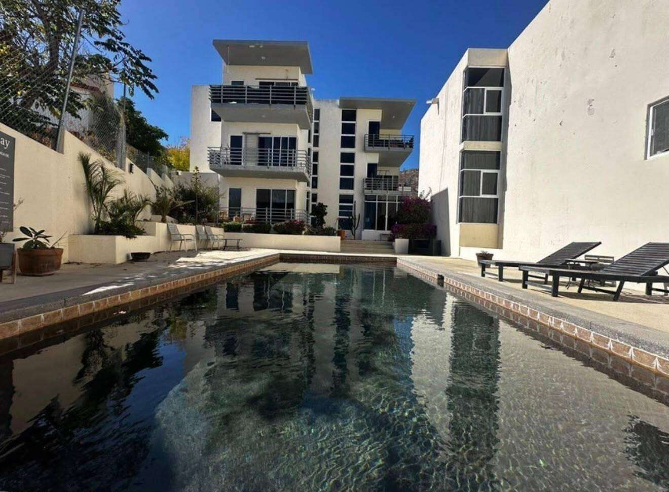 Los Cabos Centro Exceptional Space, Prime Location & Outstanding Investment OpportunityDiscover the perfect combination of location, space, and lifestyle in this spacious condominium, ideally situated just 2 minutes by car or approximately a 10-minute walk from downtown Cabo San Lucas. Enjoy quick access to the Marina, restaurants, shopping, beaches, and everyday conveniences while living in a peaceful residential community.Offering 118 m² (1,270 sq. ft.) of interior living space plus a 19 m² (205 sq. ft.) private patio, this home is significantly larger than most two-bedroom condos currently available in Cabo San Lucas. Property features include:* 2 oversized bedrooms, each with its own closet.* 2 full bathrooms.* Spacious primary suite with an en-suite bathroom.* Large open-concept living and dining area, ideal for entertaining or relaxing.One of the property's standout features is the 19 m² private patio, providing endless possibilities to create your own outdoor oasis--whether as a lounge area, garden, outdoor dining space, or pet-friendly retreat.The community pool is located just a few steps from the unit, making it easy to enjoy the amenities whenever you like.The condominium is located on the ground floor; however, access to the building is via stairs, as there is no elevator. The property also includes one uncovered outdoor parking space.Whether you're searching for a full-time residence, a vacation getaway, or an investment property with excellent rental potential, this condo offers an unbeatable combination of generous living spaces, a highly desirable location, and valuable private outdoor space--features that are increasingly difficult to find in Cabo San Lucas.A rare opportunity to own a spacious home just minutes from the heart of Cabo San Lucas. – 419 12 DE OCTUBRE, Cabo San Lucas, BS